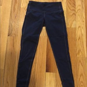 Athleta navy blue leggings with gray piping